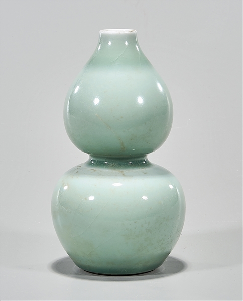 Appraisal: Chinese celadon glazed porcelain double gourd vase x approx Condition