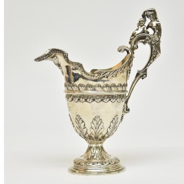 Appraisal: Heavy English silver pitcher circa with maiden child and grape