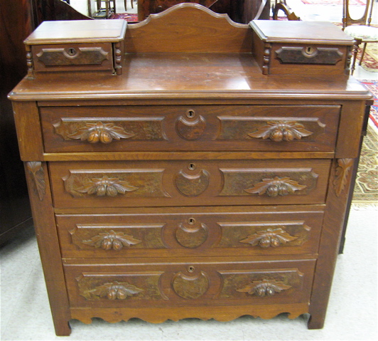 Appraisal: VICTORIAN WALNUT CHEST OF DRAWERS American c the rectangular top