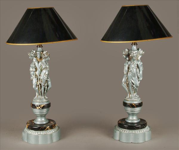 Appraisal: A pair of marble and grey-finished metal figural large table