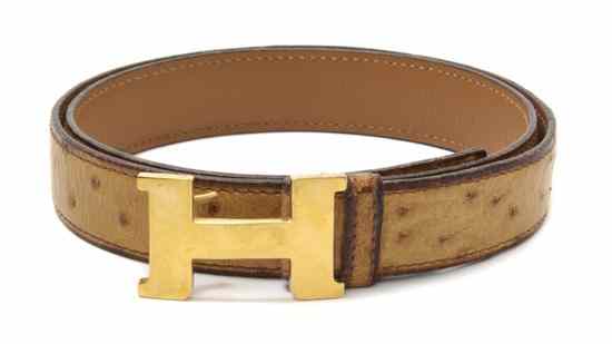 Appraisal: An Hermes 'Mini Constance' Cognac Ostrich Belt with a gold