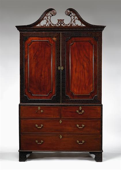 Appraisal: English mahogany linen press th th century The carved and