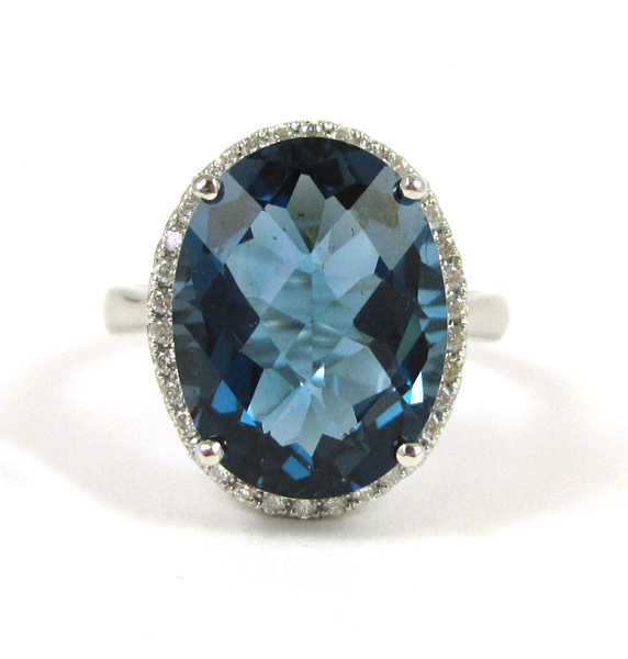 Appraisal: LONDON BLUE TOPAZ AND DIAMOND RING k white gold with