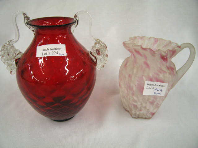 Appraisal: Pcs Art Glass cranberry white spatter pitcher and ruby vase