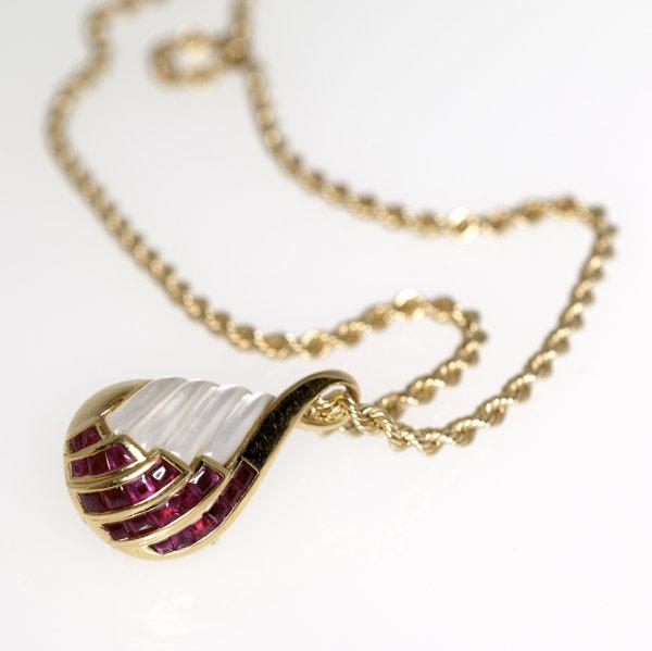 Appraisal: TIFFANY FARAONE Ruby and carved mother of pearl necklace k