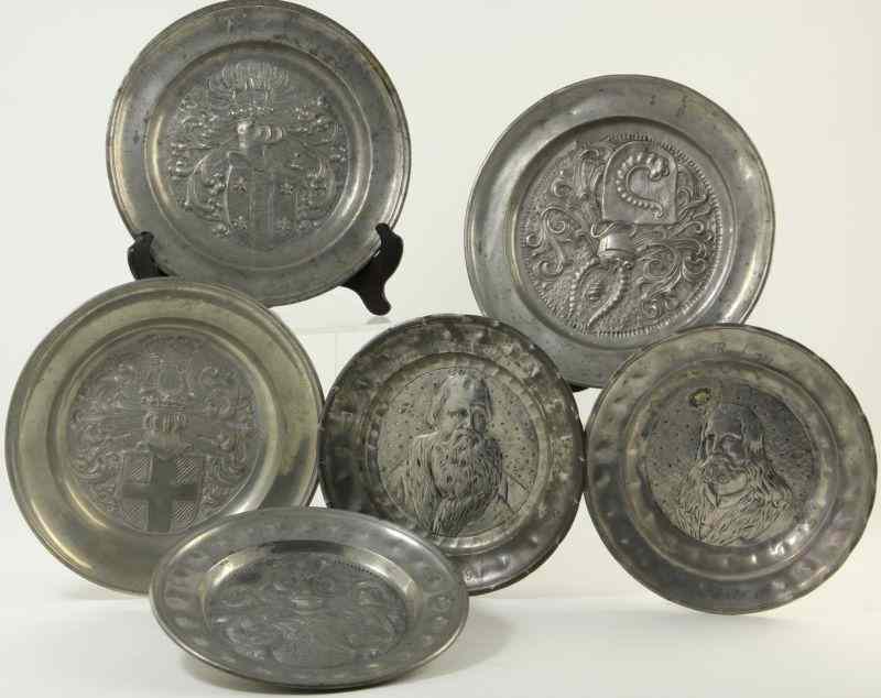 Appraisal: Six Antique German Pewter Plateslate th century figural and crest