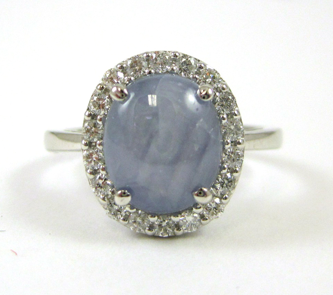 Appraisal: STAR SAPPHIRE AND DIAMOND RING k white gold with round-cut