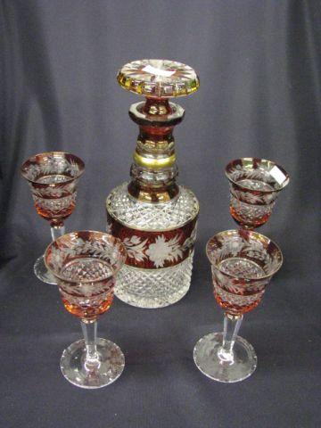 Appraisal: Cut Etched Crystal Decanter Wine glasses ruby gold trim