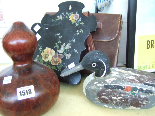 Appraisal: A painted wooden decoy duck distressed a papier mache wall