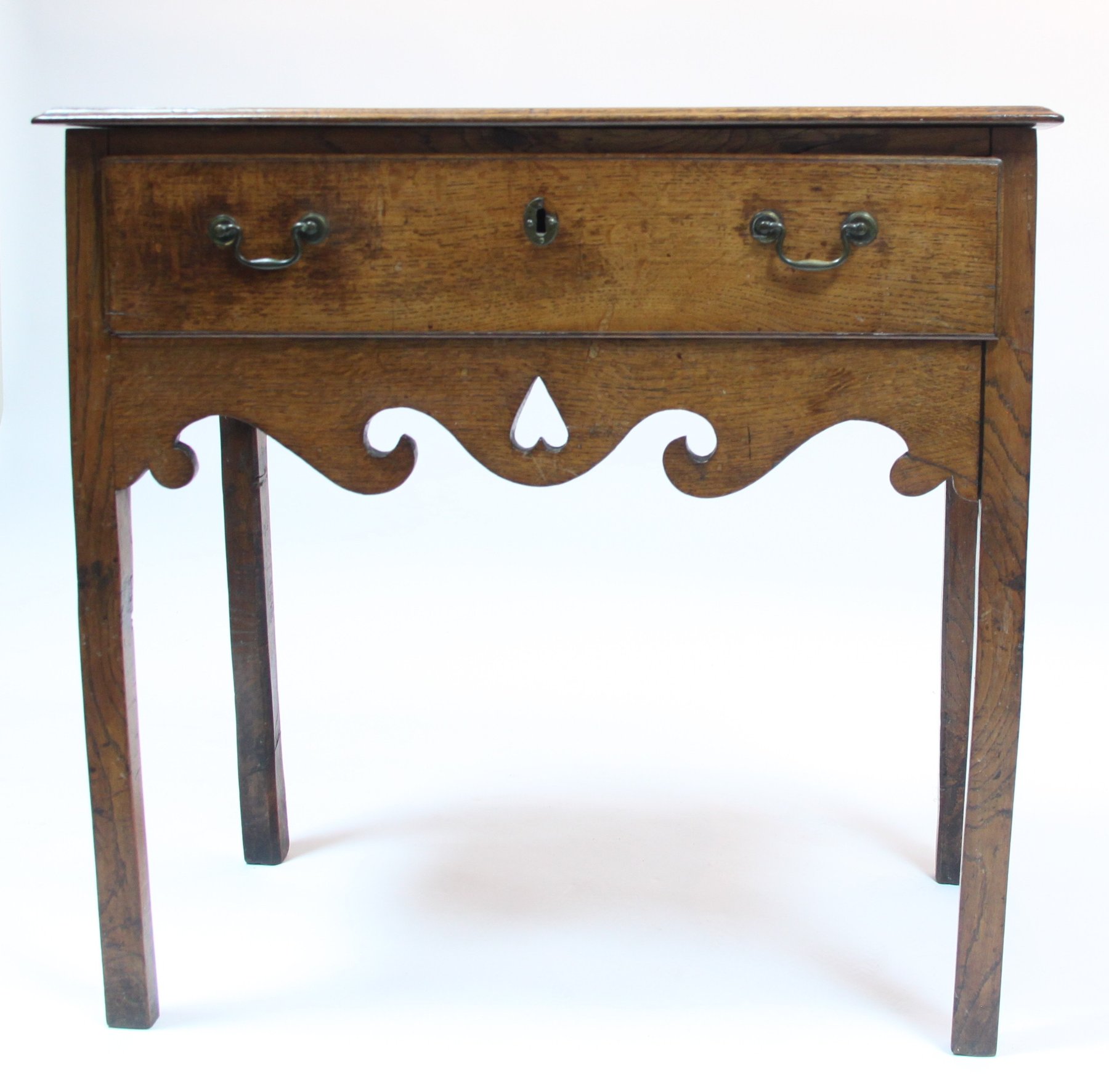 Appraisal: An early th Century oak one-drawer side table with heart