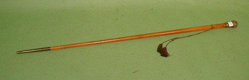 Appraisal: A thC Malacca dandy cane with a repouss metal knop