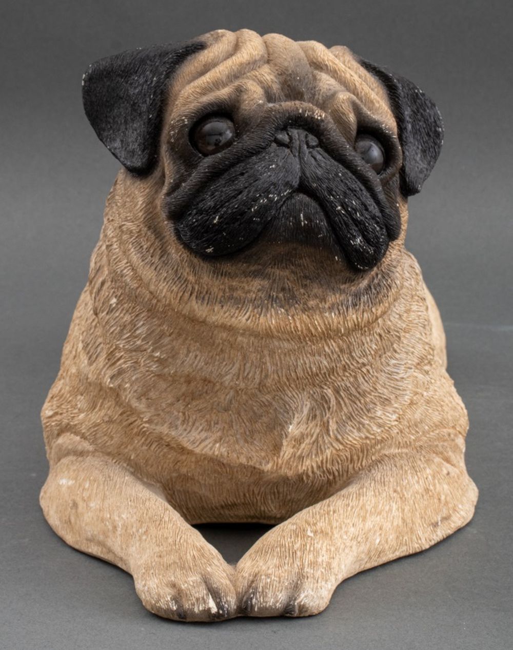 Appraisal: SANDICAST LYING FAWN PUG DOG SCULPTURE Sandicast sculpture of a