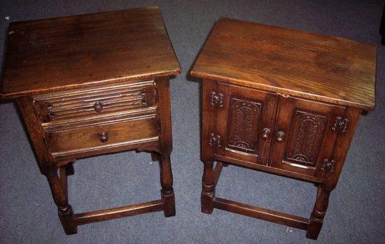 Appraisal: A reproduction oak cabinet with carved panel doors cm wide