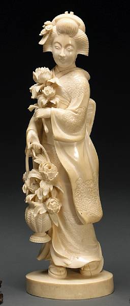 Appraisal: An ivory figural okimono th Century Portraying a bijin walking