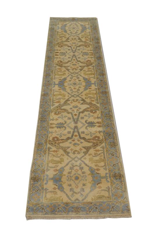 Appraisal: RUG Oushak runner '' x '' cream field with powder