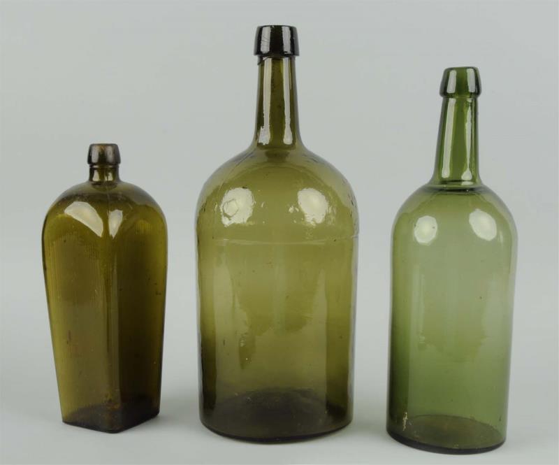 Appraisal: Lot of Light Green Bottles Includes three bottles in great