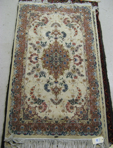 Appraisal: SILK AND WOOL AREA RUG ' x ' the first