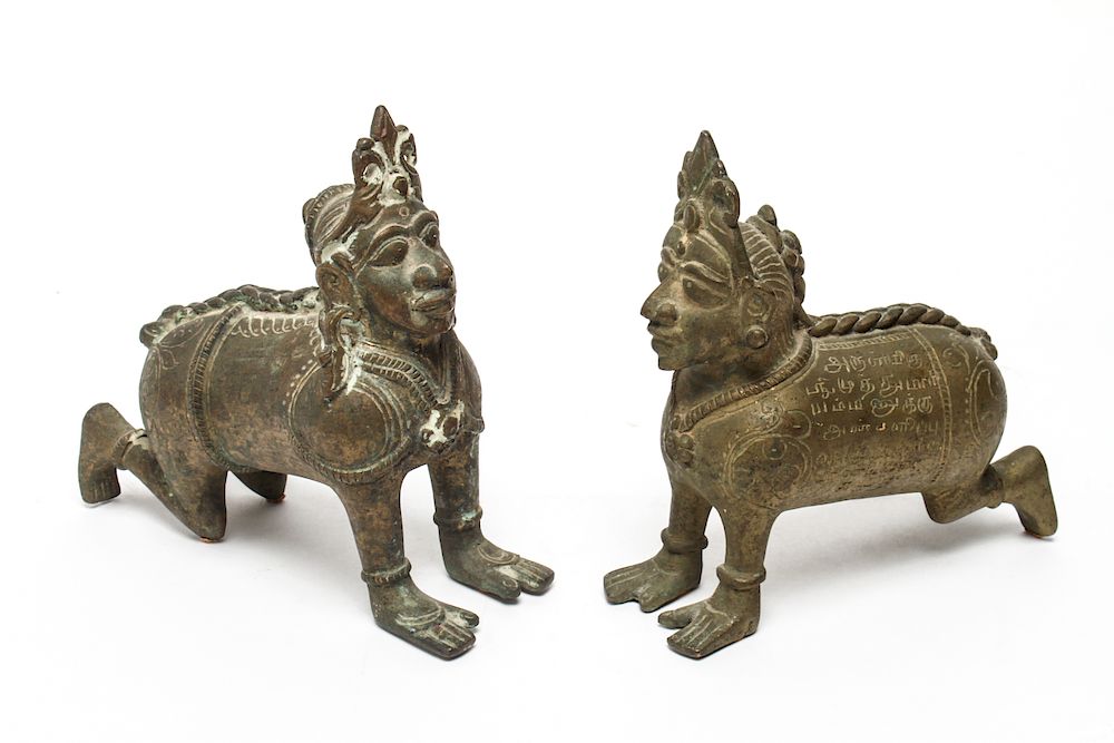 Appraisal: Southeast Asian Bronze Figural Sculptures Two Southeast Asian kneeling figures