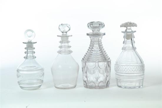 Appraisal: FOUR DECANTERS Engraved blown decanter English or Scottish nd quarter-