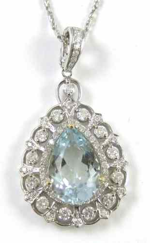 Appraisal: AQUAMARINE AND DIAMOND PENDANT NECKLACE suspended on a k white