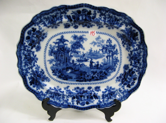 Appraisal: ENGLISH IRONSTONE FLOW BLUE OVAL PLATTER c - in the