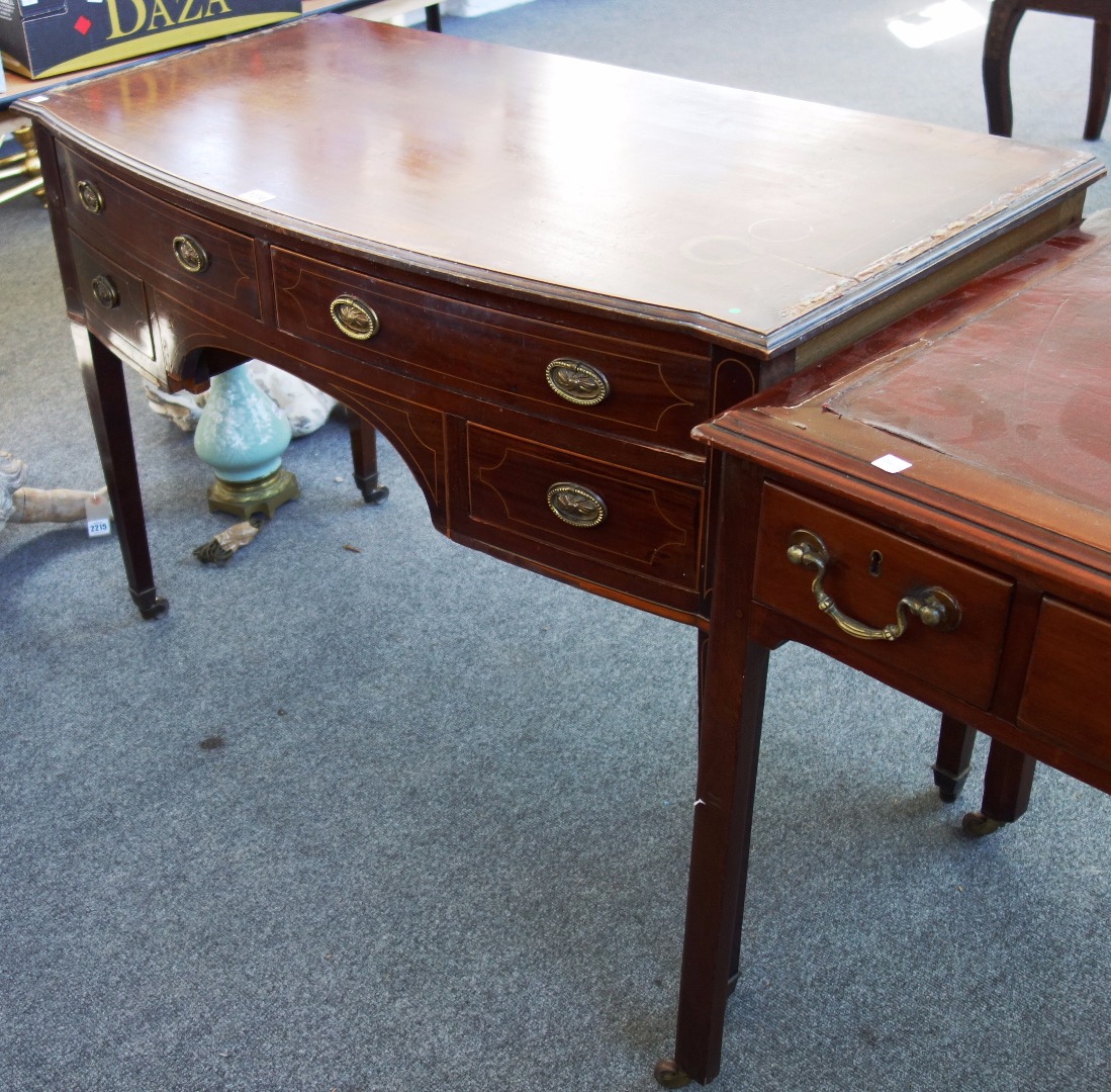 Appraisal: A th century inlaid mahogany bowfront dressing table with four