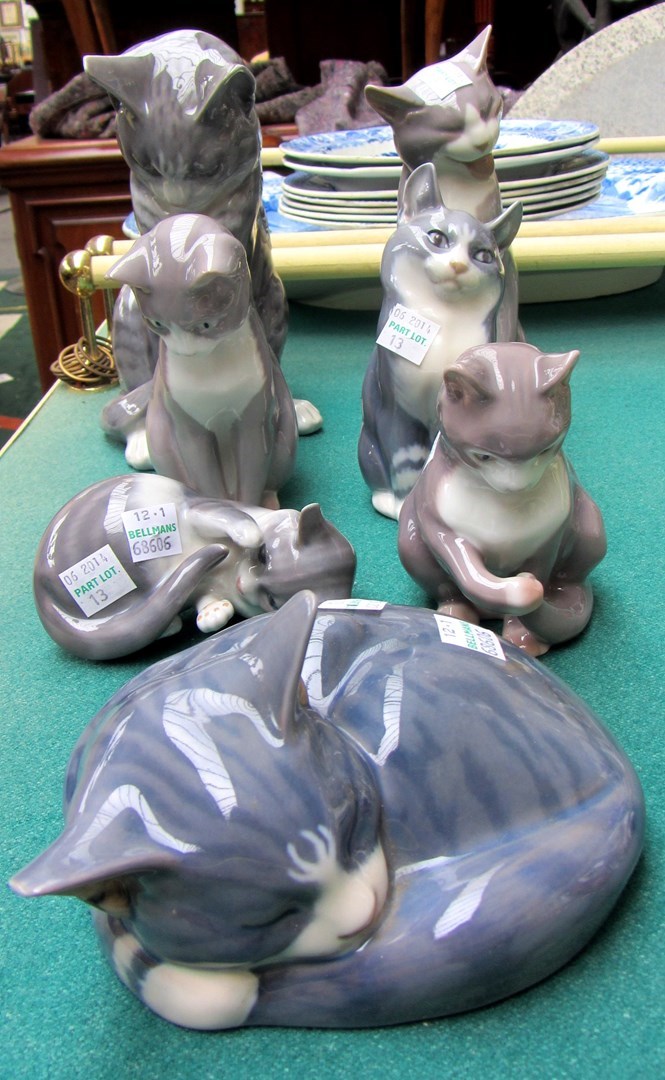 Appraisal: Four Royal Copenhagen porcelain models of cats and three Bing