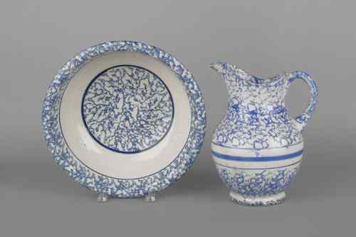 Appraisal: Blue and white spongeware pitcher and bowl th c pitcher