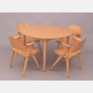 Appraisal: A Nordiska Kompaniet Laminated Birch Table with Four Chairs in