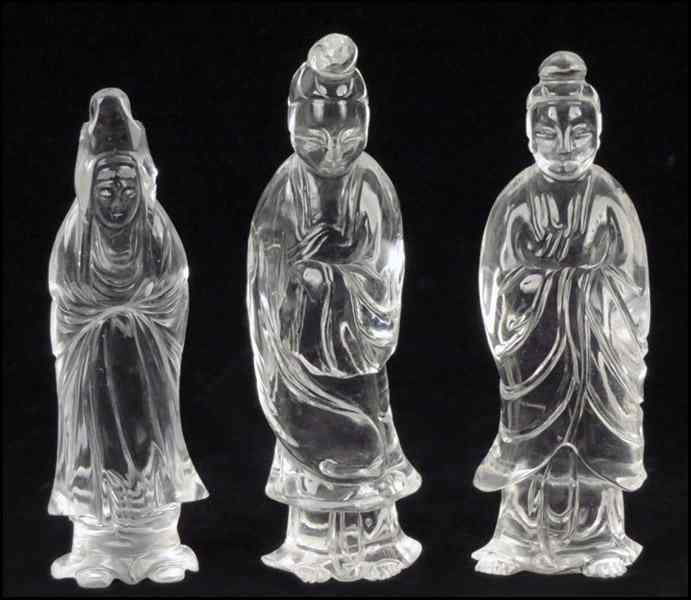 Appraisal: THREE CARVED ROCK CRYSTAL FIGURES Tallest '' Condition Left Sustains