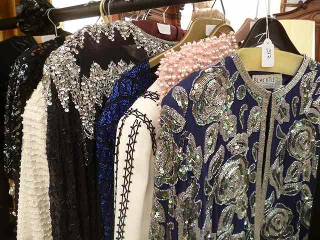 Appraisal: SIXTEEN SEQUIN AND BEADED EVENING JACKETS AND TOPS designers to