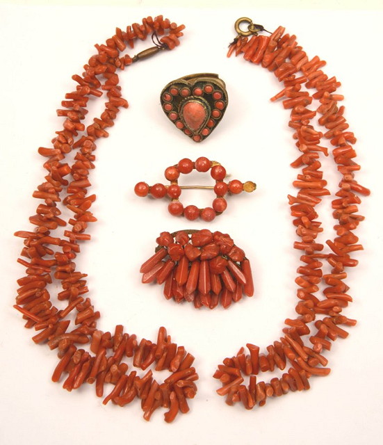 Appraisal: TWO CORAL BEAD NECKLACES together with a coral mounted ring