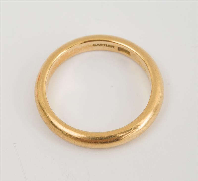 Appraisal: CARTIER K YELLOW GOLD WEDDING BAND Signed 'Cartier' and numbered