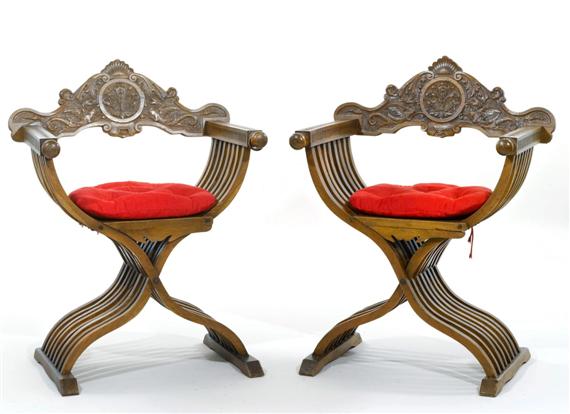 Appraisal: PAIR OF X-FRAME CHAIRS Baroque style th cent Carved walnut