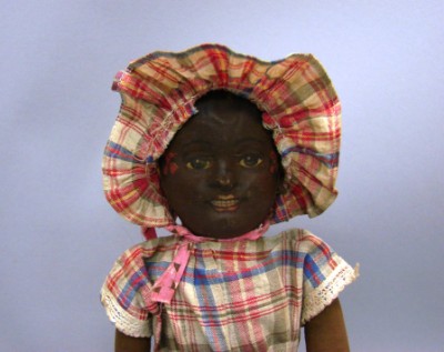 Appraisal: Black Bruckner rag doll Stiffened mask face doll with soft