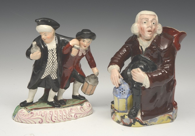 Appraisal: AN OLD STAFFORDSHIRE FIGURE of the Drunken Parson on a