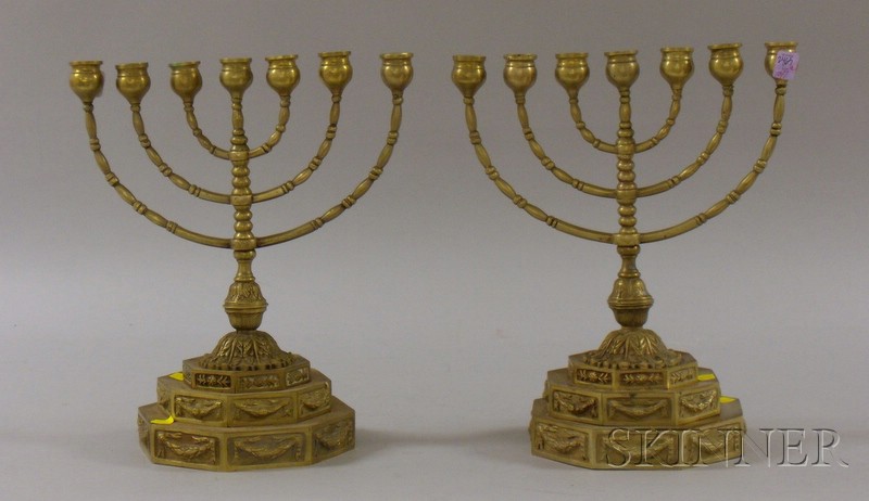 Appraisal: Pair of Brass Seven-Light Candelabra with Stepped Bases with rotating