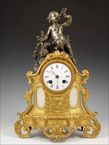 Appraisal: FRENCH FIGURAL GILT BRONZE MARBLE CLOCK Gilt bronze front with