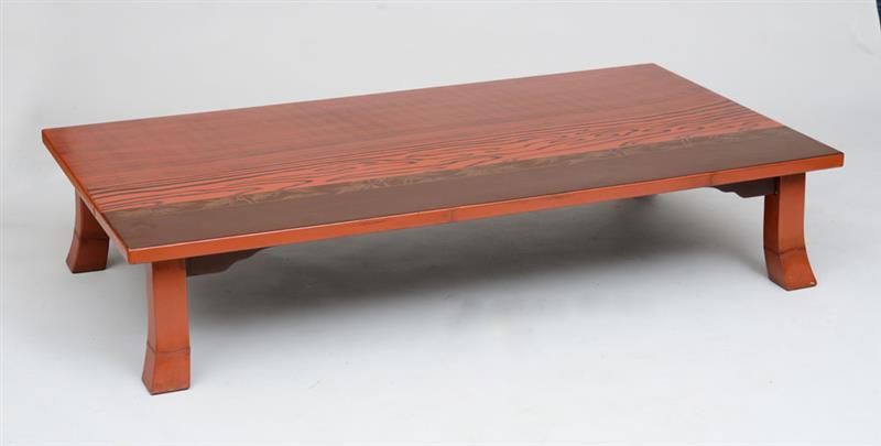 Appraisal: JAPANESE RED AND BROWN LACQUER LOW TABLE Decorated with faux