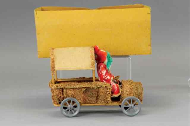 Appraisal: SANTA CLAUS MOSS CAR WITH BOX Germany hand painted composition