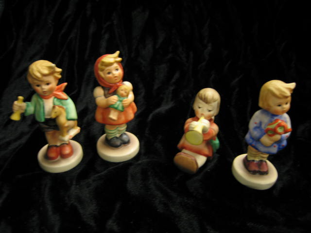 Appraisal: Hummel Figurines angel with lute boy with horse girl with