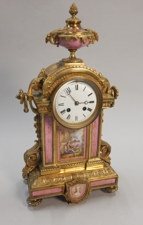 Appraisal: A thC French gilt metal and porcelain mounted mantel clock