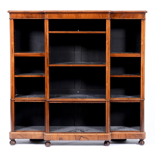 Appraisal: A Victorian breakfront rosewood open bookcase on bun feet cm