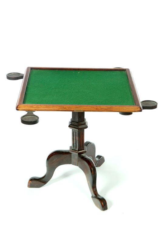 Appraisal: CLASSICAL GAMES TABLE American th century mahogany Old dark varnish