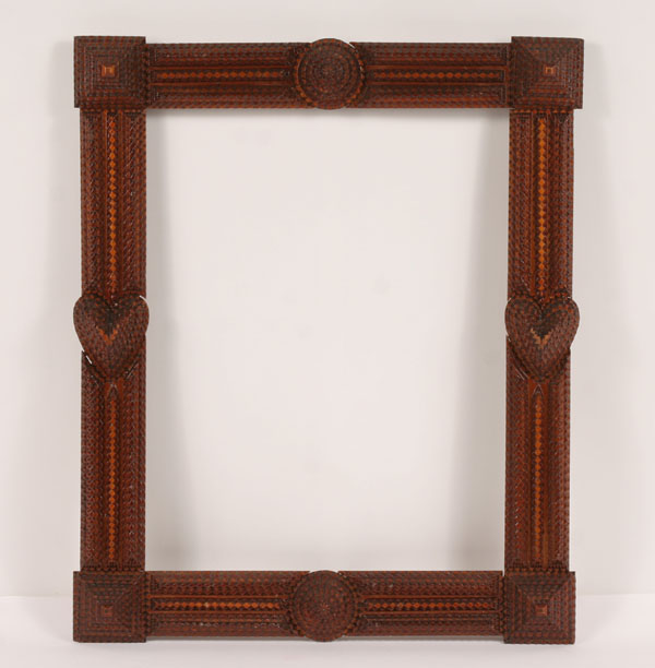 Appraisal: Tramp art frame layered construction with pyramid heart and rosette