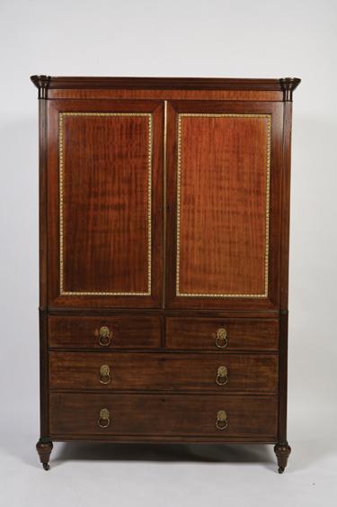 Appraisal: A REGENCY MAHOGANY AND GILT LINEN PRESS with a moulded