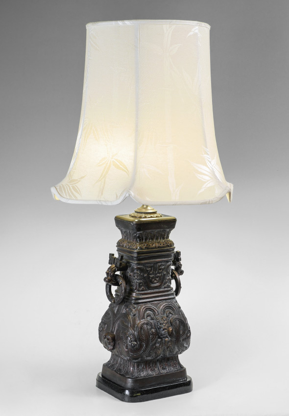 Appraisal: CHINESE REPUBLIC PERIOD ARCHAIC STYLE LAMP Patinated bronze archaic style