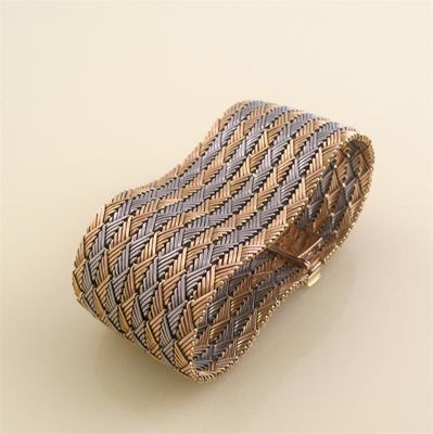 Appraisal: An integrated two colour gold wide strap bracelet g cm