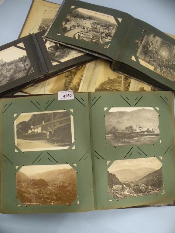 Appraisal: Four albums of postcards mainly depicting continental scenes and some