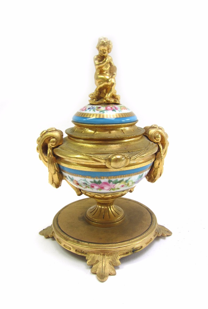 Appraisal: An early th century gilt bronze Sevres style porcelain lidded